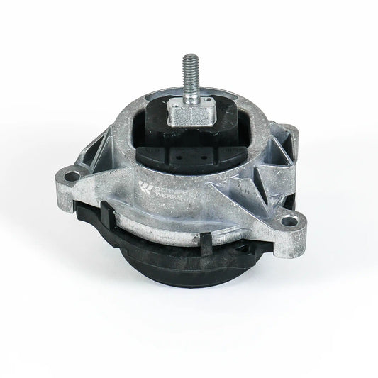 A metal and rubber automotive engine mount with a threaded bolt on top, photographed on a clean white background.
